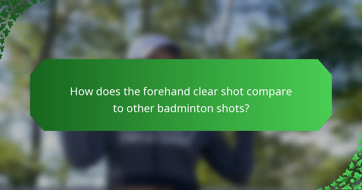 How does the forehand clear shot compare to other badminton shots?